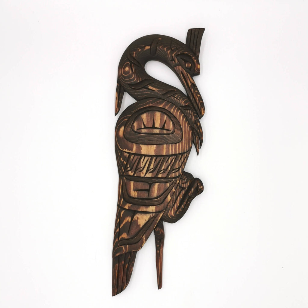 Heron carving by indigenous artist